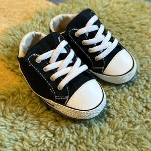 New unworn babys first converse with velcro top. Black and white baby size 4